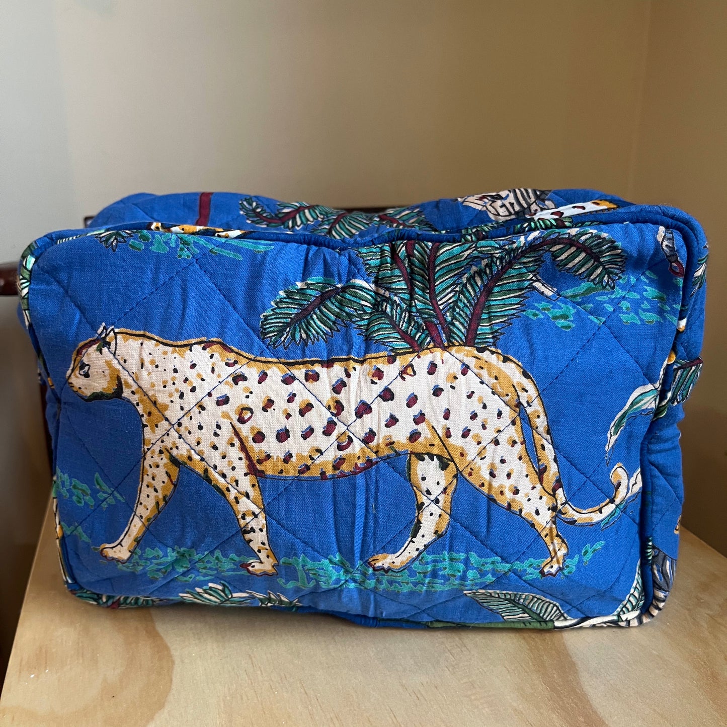 Hand screen printed jungle print cotton toiletry bag - blue